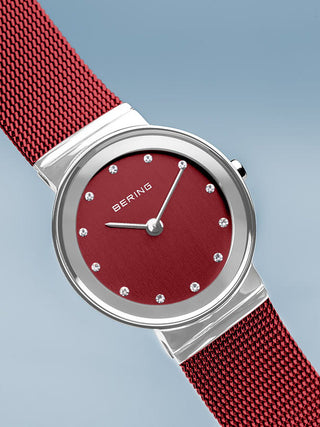 Angle shot of Bering 10126-303 Red Dial Stainless Steel Womens Watch on white background