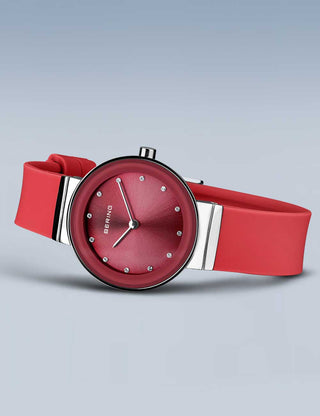 Angle shot of Bering 10129-503 Red Dial Silicone Womens Watch on white background