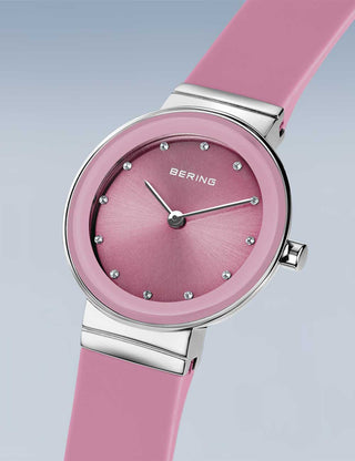 Angle shot of Bering 10129-909 Pink Silicone Womens Watch on white background