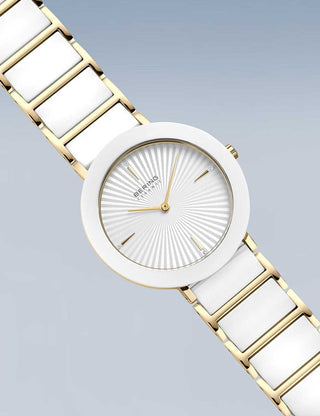 Angle shot of Bering 11435-758 White Dial Gold Stainless Steel Womens Watch on white background