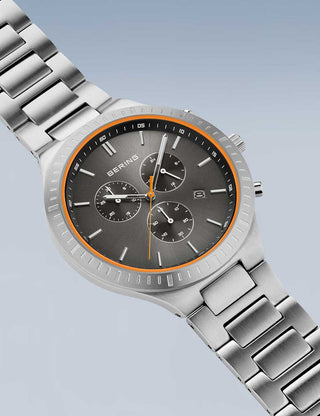 Angle shot of Bering Chronograph 11743-709 Grey Dial Silver Titanium Unisex Watch on white background