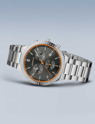 Angle shot of Bering Chronograph 11743-709 Grey Dial Silver Titanium Unisex Watch on white background