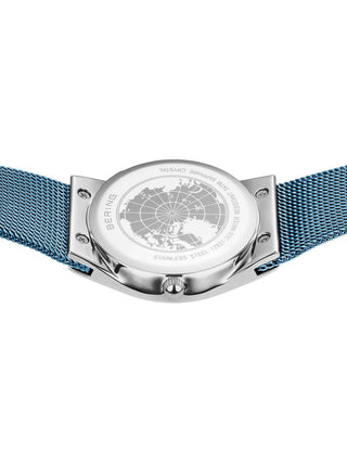 Angle shot of Bering 12927-308 Blue Stainless Steel Womens Watch on white background