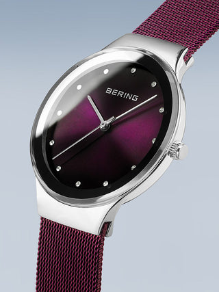 Angle shot of Bering 12934-909 Purple Stainless Steel Womens Watch on white background