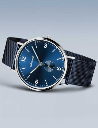 Angle shot of Bering 14040-307 Blue Stainless Steel Unisex Watch on white background