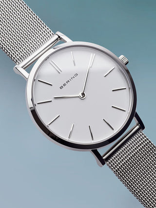 Angle shot of Bering 14134-004 White Dial Silver Stainless Steel Womens Watch on white background