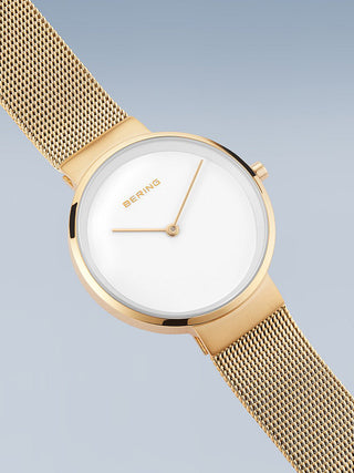 Angle shot of Bering 14531-334 White Dial Gold Stainless Steel Womens Watch on white background