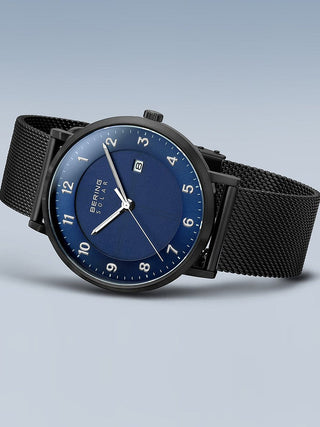 Angle shot of Bering 15439-327 Blue Dial Black Stainless Steel Unisex Watch on white background