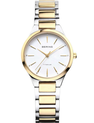 Front view of Bering 15630-701 White Dial Gold Titanium Womens Watch on white background