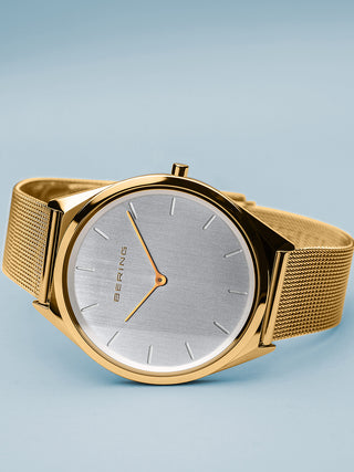 Angle shot of Bering 17039-334 Silver Dial Gold Stainless Steel Unisex Watch on white background