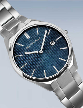 Angle shot of Bering 17240-707 Blue Dial Silver Stainless Steel Unisex Watch on white background