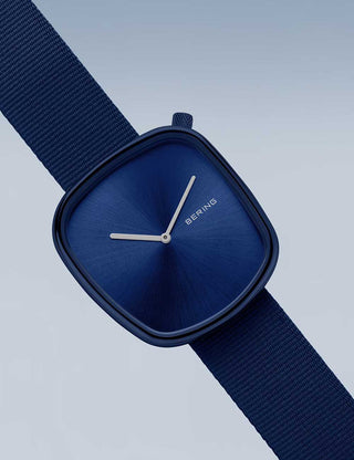 Angle shot of Bering 18040-397 Blue Textile Unisex Watch on white background