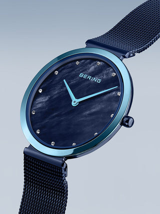 Angle shot of Bering 18132-398 Blue Stainless Steel Womens Watch on white background