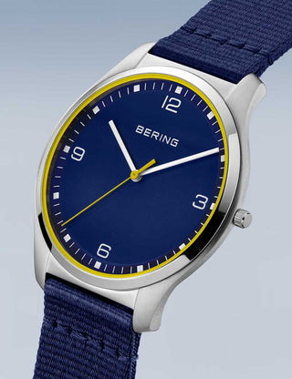 Angle shot of Bering 18342-507 Blue Textile Unisex Watch on white background