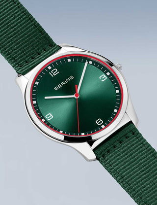 Angle shot of Bering 18342-508 Green Textile Unisex Watch on white background