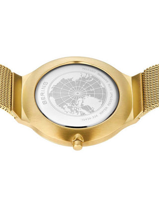 Angle shot of Bering 18434-336 Pink Dial Gold Stainless Steel Womens Watch on white background