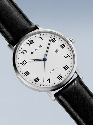 Angle shot of Bering 18640-404 White Dial Black Leather Unisex Watch on white background