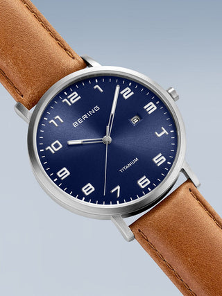 Angle shot of Bering 18640-567 Blue Dial Brown Leather Unisex Watch on white background