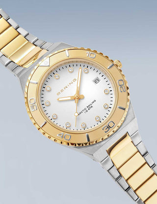 Angle shot of Bering 18936-710 White Dial Gold Stainless Steel Womens Watch on white background