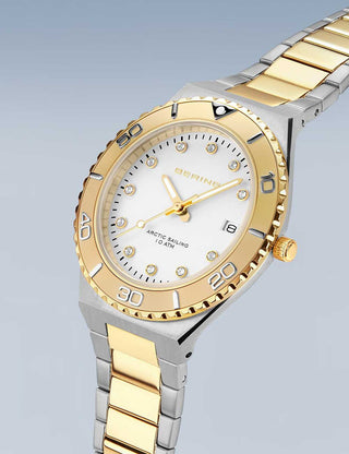 Angle shot of Bering 18936-710 White Dial Gold Stainless Steel Womens Watch on white background