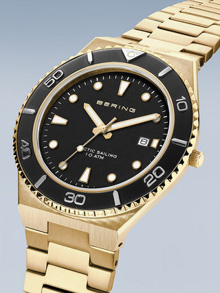 Angle shot of Bering 18940-732 Black Dial Gold Stainless Steel Unisex Watch on white background