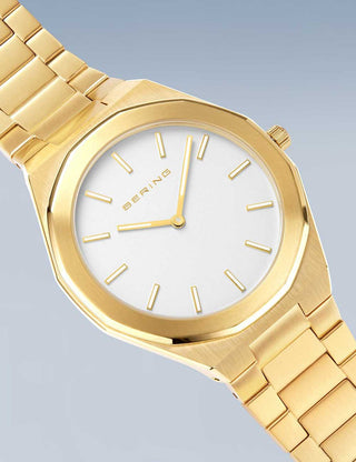 Angle shot of Bering 19641-730 Silver Dial Gold Stainless Steel Unisex Watch on white background