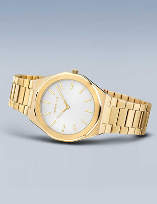 Angle shot of Bering 19641-730 Silver Dial Gold Stainless Steel Unisex Watch on white background