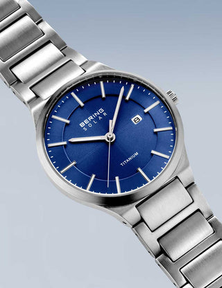 Angle shot of Bering 15239-777 Blue Dial Silver Titanium Unisex Watch on white background