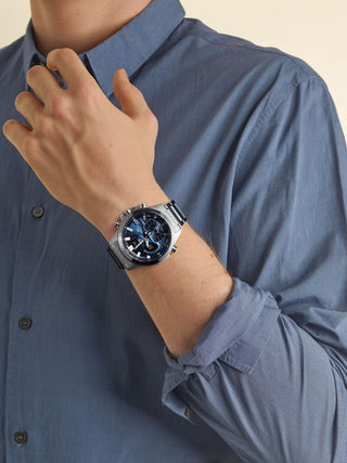 Angle shot of Casio Edifice ECB-30D-2AEF Blue Dial Grey Stainless Steel Mens Watch on white background